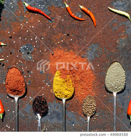 silver spoon with various spices silver spoon with various spices 69068588