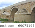 Puente Romano (Spain/Cordoba) in Cordoba's Roman Bridge over the Guadalquivir River 69073195