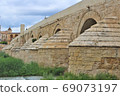 Puente Romano (Spain/Cordoba) in Cordoba's Roman Bridge over the Guadalquivir River 69073197