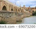 Puente Romano (Spain/Cordoba) in Cordoba's Roman Bridge over the Guadalquivir River 69073200