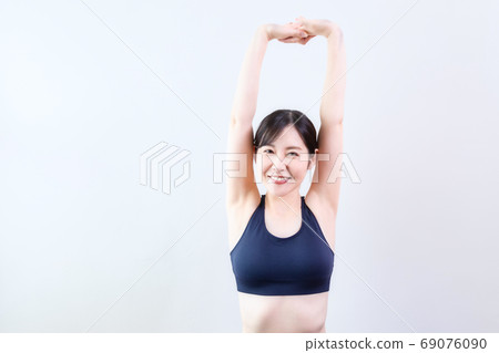Women stretching Women stretching 69076090