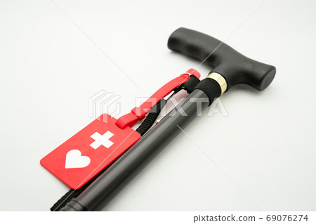 Cane and help mark on white background 69076274