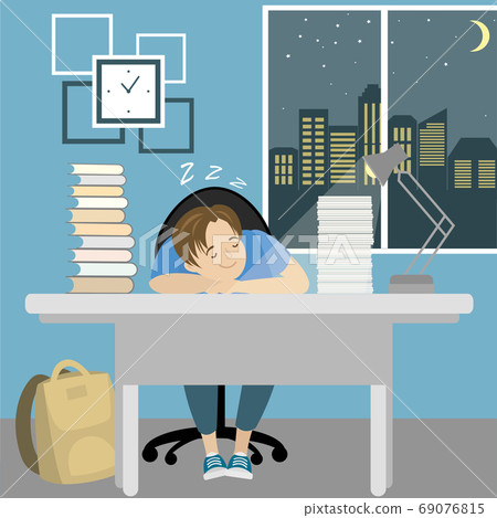 Tired teenager boy sleep at the table with books Tired teenager boy sleep at the table with books 69076815