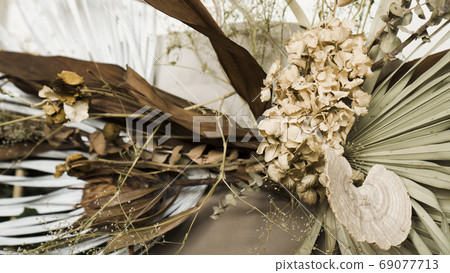 Bouquet of dried flowers in interior 69077713