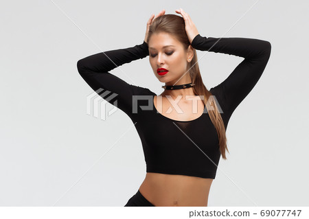 Slim woman in sexy lingerie and boots 69077747