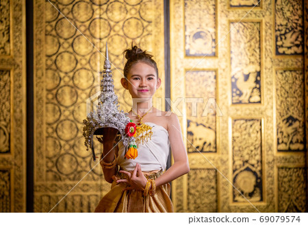 Children in Traditional Thai dancer costume, Thailand	 69079574