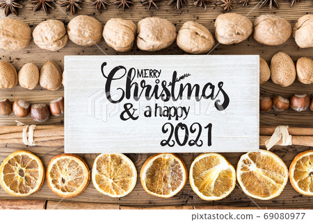 Christmas Food Flat Lay, Label With Merry Christmas And Happy 2021 Christmas Food Flat Lay, Label With Merry Christmas And Happy 2021 69080977