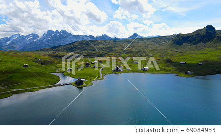 Wonderful Mountain Lake in the Swiss Alps - aerial view 69084933