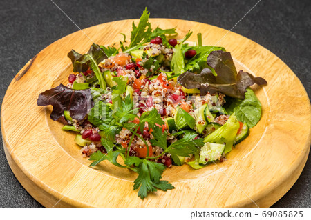 Quinoa and vegetable healthy salad 69085825
