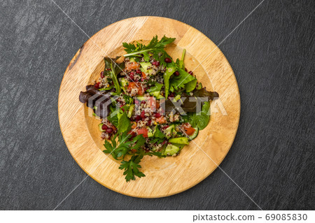 Quinoa and vegetable healthy salad 69085830