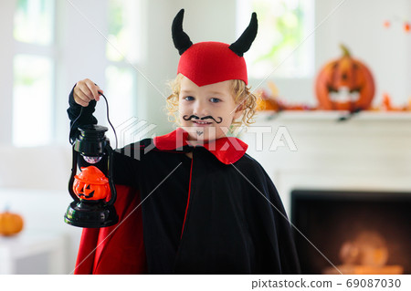 Child in Halloween costume. Kids trick or treat. Child in Halloween costume. Kids trick or treat. 69087030