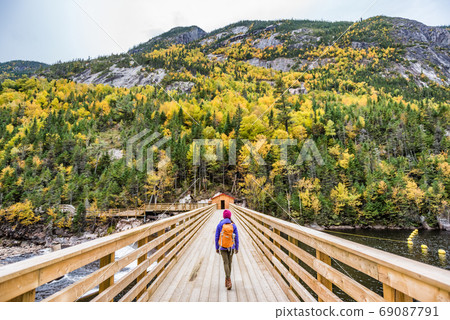 Hike woman walking in forest nature outdoor bridge Hike woman walking in forest nature outdoor bridge 69087791