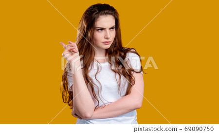 suspicious woman portrait distrust jealousy mad 69090750
