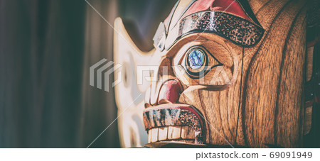 Alaska totem pole carving art sculture store in tourist travel Alaska cruise panoramic banner background. Ketchikan, Juneau, Skagway stores and shops selling native paintings. 69091949