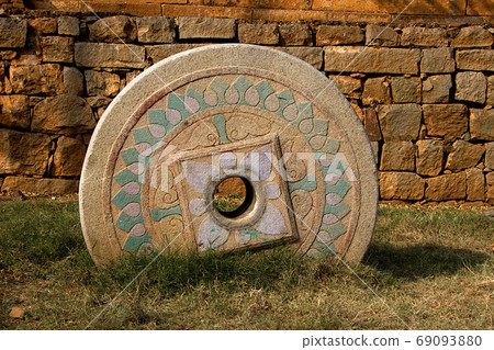 Embedded, Carved Stone Wheel Embedded, Carved Stone Wheel 69093880