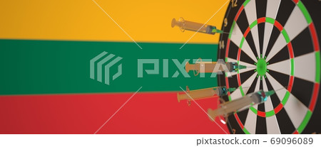 Syringes with a vaccine hit target near the Lithuanian flag. Successful medical research and vaccination in Lithuania. Conceptual 3D rendering 69096089