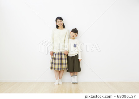 Mother-daughter smile Mother-daughter smile 69096157