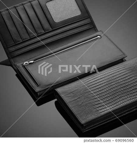 men's wallet on a black background men's wallet on a black background 69096560