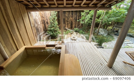 Scenery of a Japanese inn with an open-air bath Scenery of a Japanese inn with an open-air bath 69097406