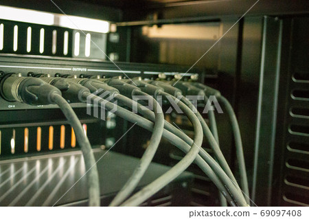 Fiber Optical connector interface. Fibre Channel swich. Severs computer in a rack at the large data center. has a small noise. 69097408