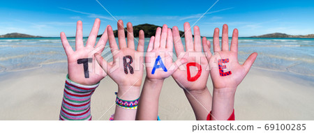 Children Hands Building Word Trade, Ocean Background 69100285
