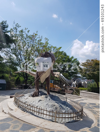 Seodaemun Museum of Natural History Dinosaur Wearing a Corona Era Mask 69101243