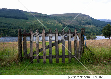 Old Timber Gate to a Scottish Loch Side 69102166