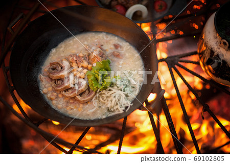 cooking on fire cooking on fire 69102805
