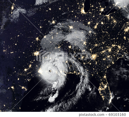 Storm Laura over USA at night, view of tropical hurricane eye fr 69103160