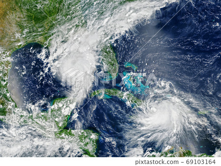 Laura and Marco storms are approaching USA, view of two tropical 69103164