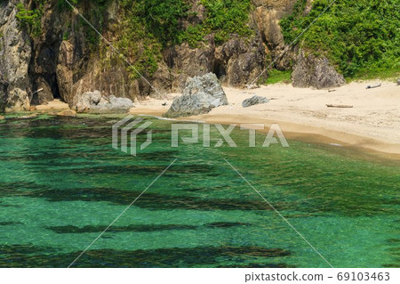 Clear Sasakawa stream and blue sea Murakami city, Niigata prefecture 69103463