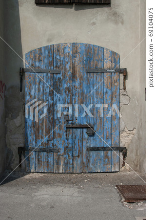 Blue Rustic Door, old barn, wooden texture Blue Rustic Door, old barn, wooden texture 69104075
