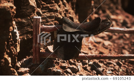 Saddle and red rocks in monument valley 69105243