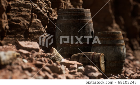 old wooden vintage wine barrels near stone wall in canyon old wooden vintage wine barrels near stone wall in canyon 69105245