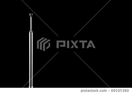 Telescopic Radio Antenna on a Black Background 69105360