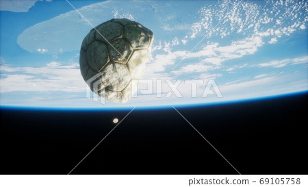 old soccer ball in space on Earth orbit old soccer ball in space on Earth orbit 69105758