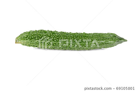 uncooked whole fresh bitter gourd on white background 69105801