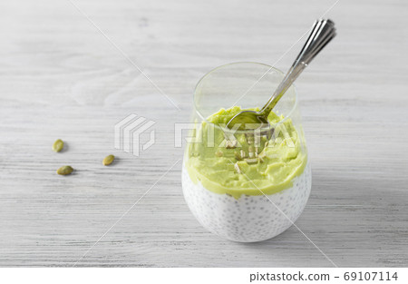 Healthy chia pudding made with avocado and seeds. White background. 69107114