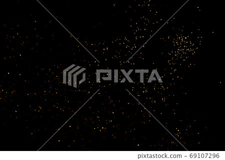 Golden abstract bokeh on black background. Golden abstract bokeh on black background. 69107296
