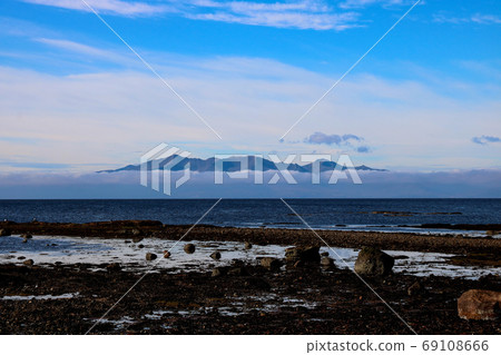 Isle of Arran in Cloud From Seamill Beach Scotland Isle of Arran in Cloud From Seamill Beach Scotland 69108666