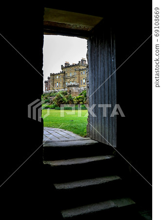 View of Culzean Castle Scotland Through an old Open Doorway 69108669
