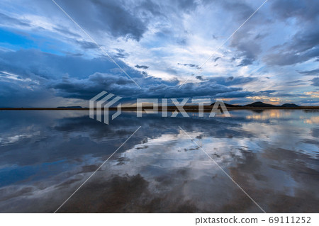 Sunset view of mother beach 69111252