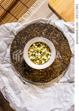 pressed puer tea top view. Chinese puer shu and shen in the form of pancakes. top view 69111961