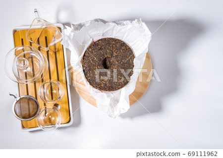 Chinese puer fermented and pressed tea. Healthy nutrition and antioxidant drinks. 69111962