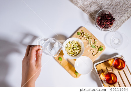 Chinese tea party. Dry granules of different types of tea. Flatlay, top view. herbal tea 69111964