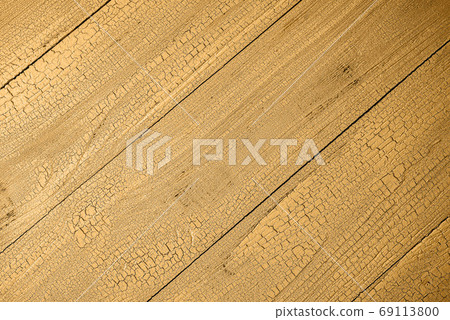Wooden background toned in honey dijon color. Wooden background toned in honey dijon color. 69113800
