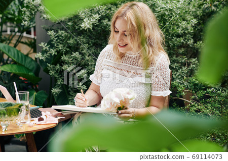 Creative woman drawing sketch 69114073