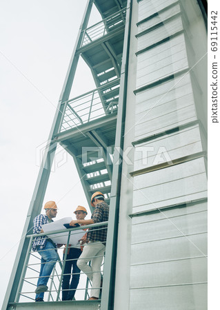 Construction engineers planning works 69115442