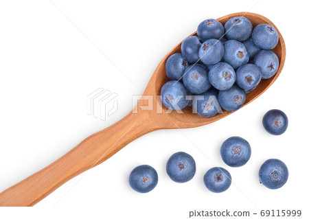 fresh ripe blueberry in wooden spoon isolated on white background with clipping path . Top view with copy space for your text. Flat lay fresh ripe blueberry in wooden spoon isolated on white background with clipping path . Top view with copy space for your text. Flat lay 69115999