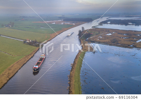 Aerial view of inland freight ships 69116304